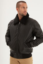 Daytona's black cowhide aviator jacket. Fur collar, timeless design. - Image n°1
