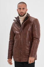 A bison-brown sheepskin jacket, mid-length with adjustable collar. - Image n°2