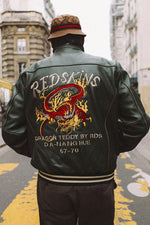 Forest green cowhide teddy with dragon embroidery and oversized fit. - Image n°1