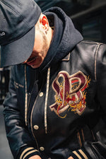 Oversized cowhide jacket with dragon embroidery and Redskins accents. - Image n°2