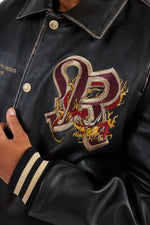 Oversized cowhide jacket with dragon embroidery and Redskins accents. - Image n°8