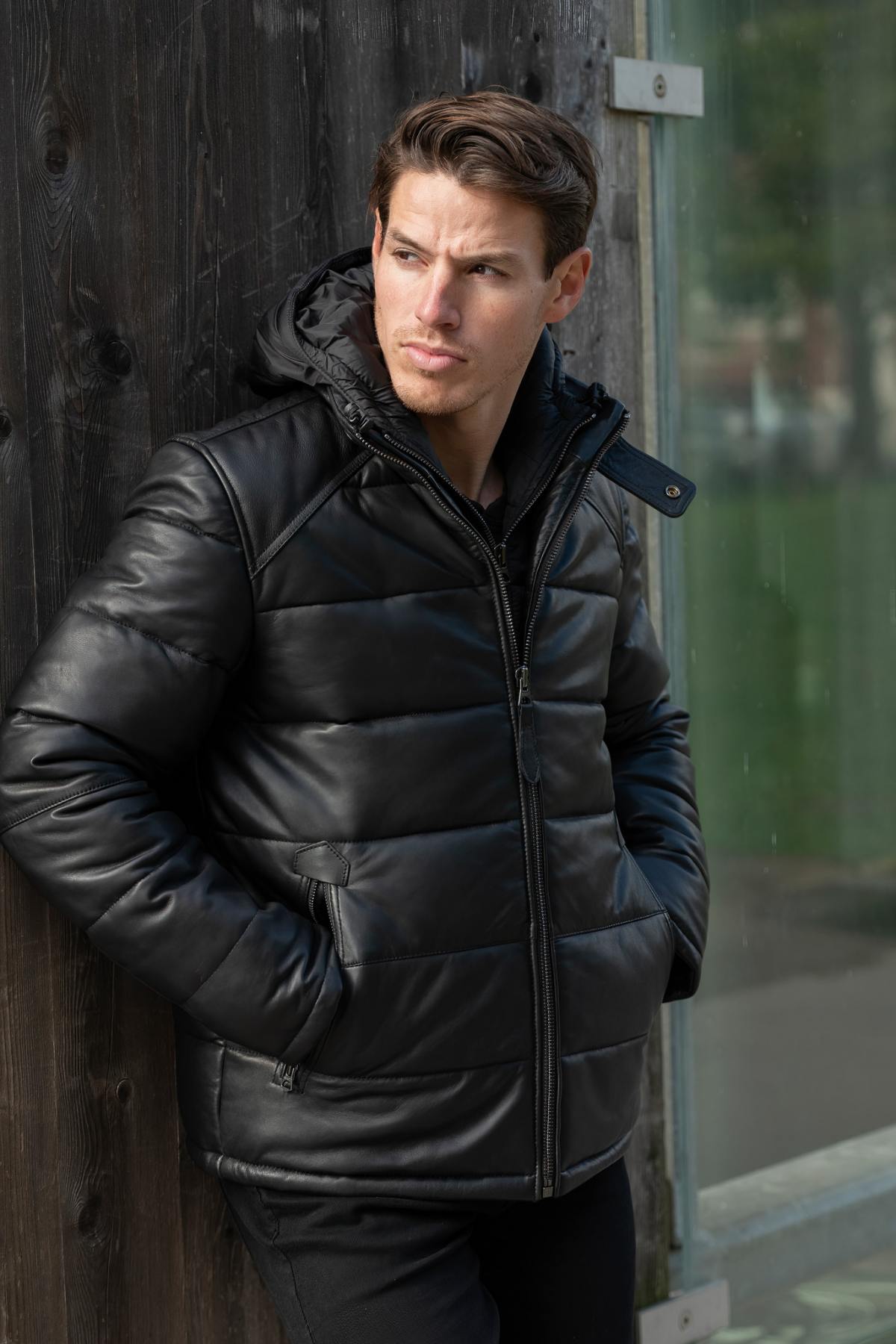 Black leather down jacket with removable hood - Image n°1