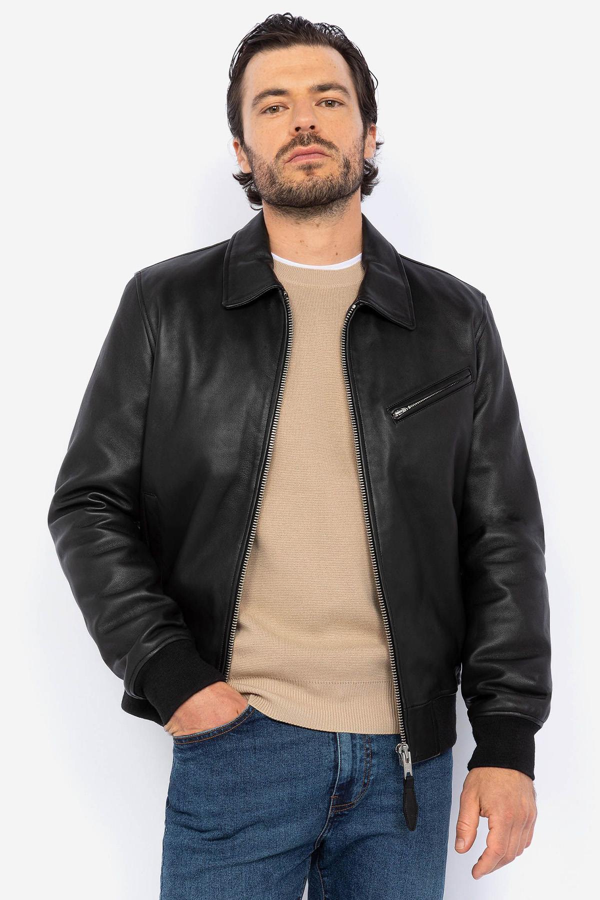 Black leather jacket with shirt collar and ribbed edges - Image n°1