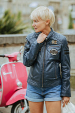 A short sheep leather jacket in blue, ideal for sporty-casual style. - Image n°1