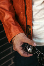 Orange racing leather jacket with vintage patches - Image n°7