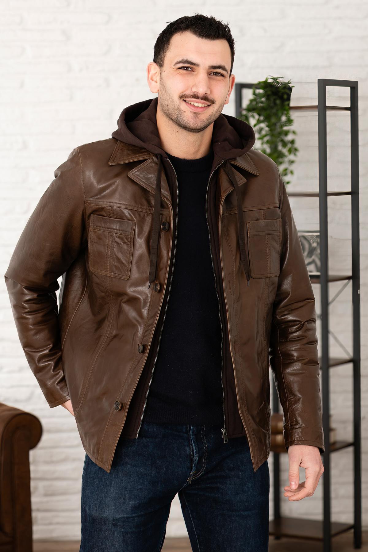 Serge Pariente's Mocca buffalo leather jacket with removable hood. - Image n°1