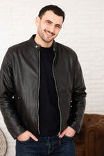 Schott's black lambskin jacket: timeless biker style, soft and light. - Image n°1
