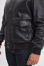 Black leather bomber jacket with sheepskin fur collar - Image n°4