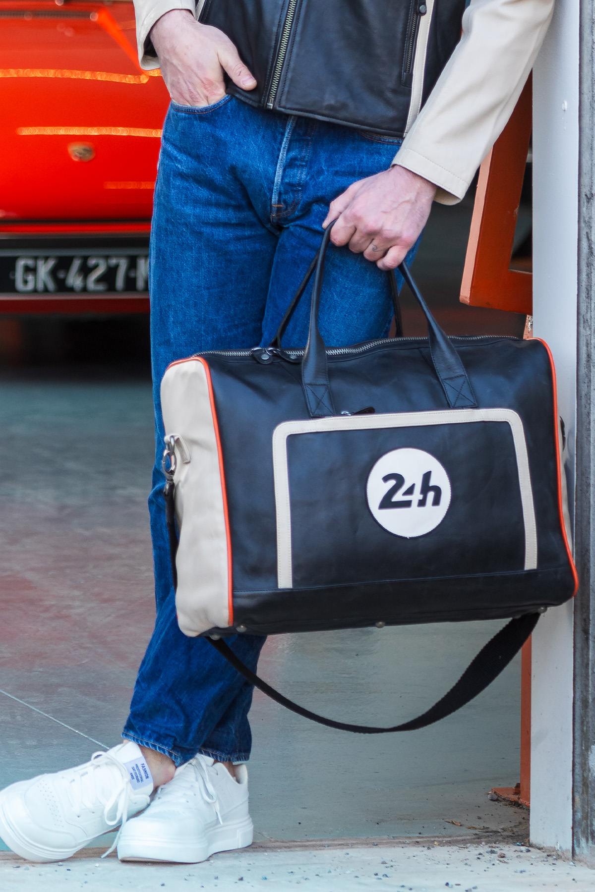 48-hour black leather travel bag with 24-hour Le Mans theme - Image n°1