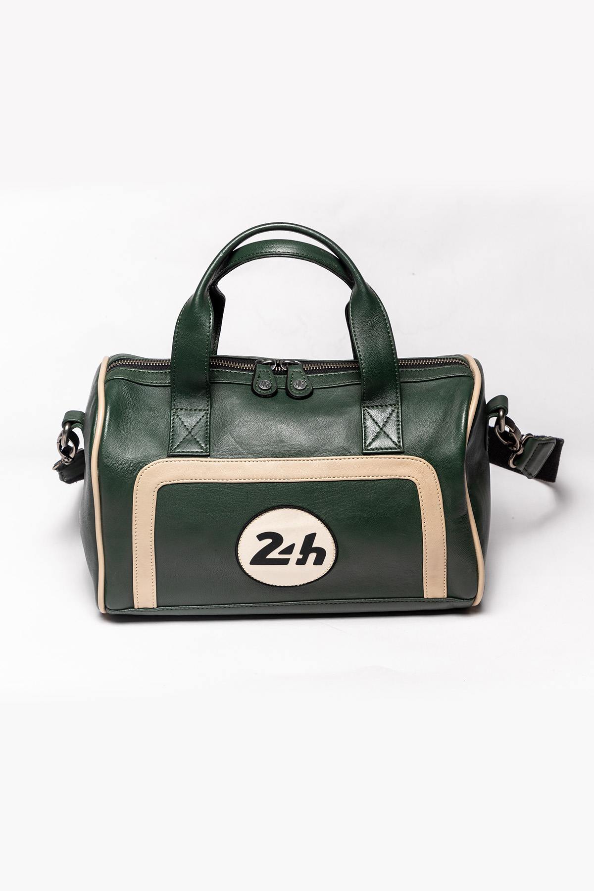 Racing green leather handbag with ecru inserts - Image n°1