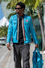 Nordic blue sheepskin jacket with slim fit and racing details. - Image n°1