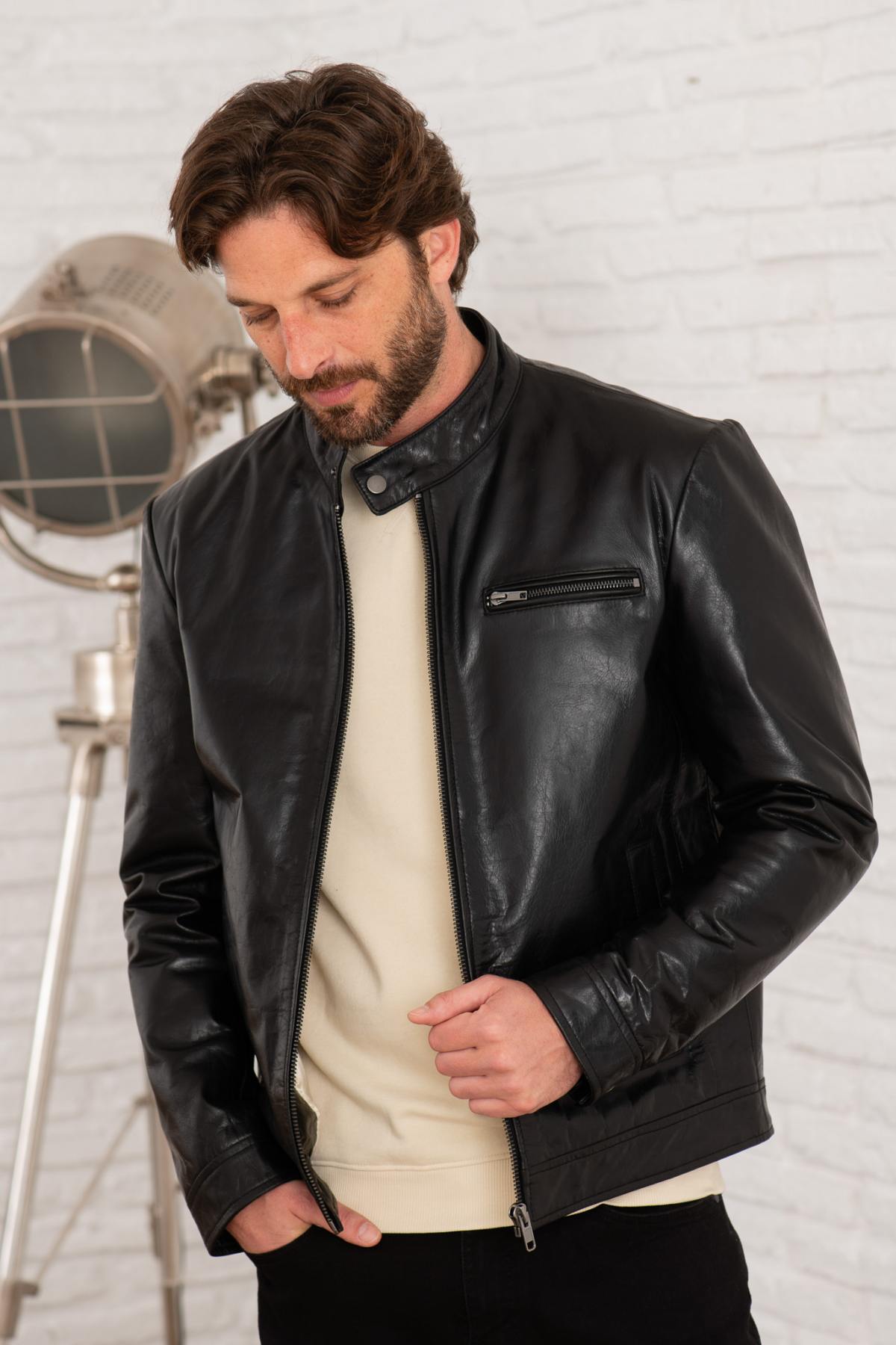 Black smooth leather jacket with minimalist biker collar - Image n°1