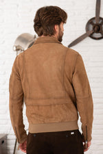 Suede leather bomber jacket with metal emblem - Image n°5