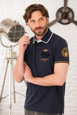 Navy blue and gold polo shirt - Image n°1