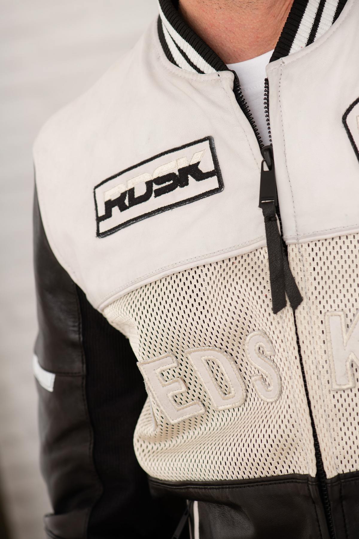 Redskins' black-and-white lambskin bomber with teddy collar and mesh. - Image n°8