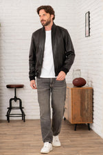 Black leather jacket with stand-up collar and ribbed edges - Image n°2