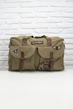 Khaki messenger bag with patches - Image n°1