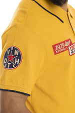 Yellow cotton twill polo shirt with badges - Image n°5