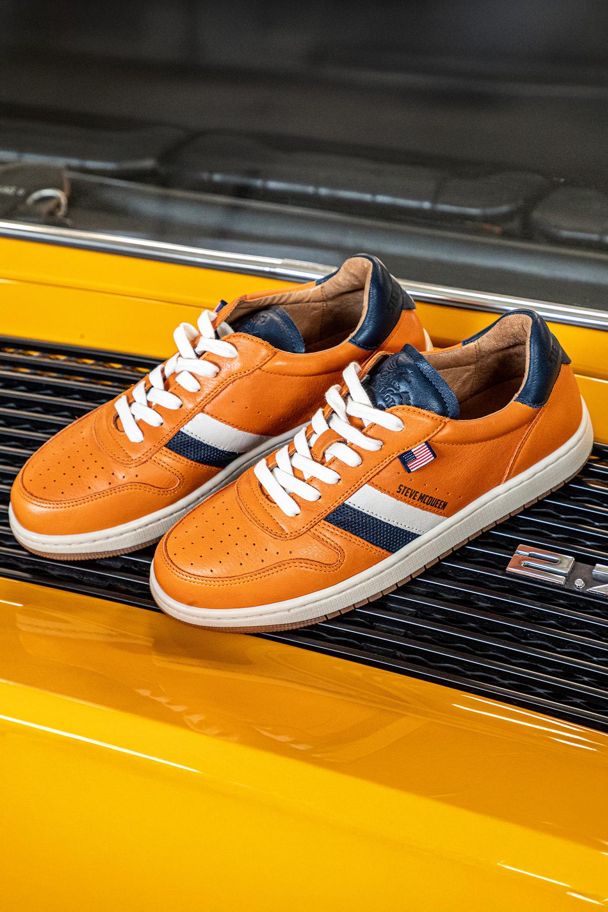 Steve McQueen orange leather sneakers - Image n°1