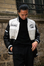 Redskins' black-and-white lambskin bomber with teddy collar and mesh. - Image n°11