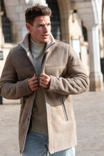 Elegant coat in aged sand-coloured shearling - Image n°1
