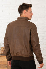 Vintage brown leather jacket with shirt collar and ribbed edges at waist and cuffs - Image n°2