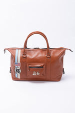 Le Mans 66 rust-colored leather travel bag - Image n°1