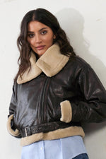 Dark brown leather cropped bomber jacket with faux fur - Image n°1