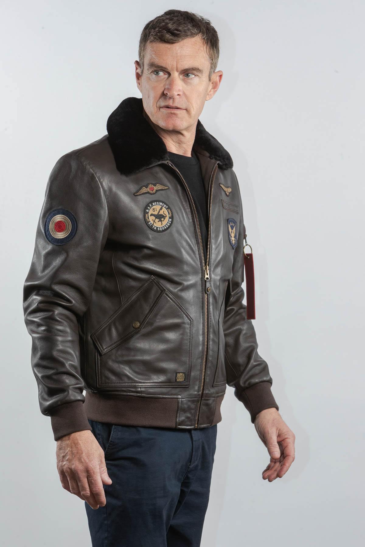 Dark brown leather bomber jacket with Royal Air Force patches - Image n°1