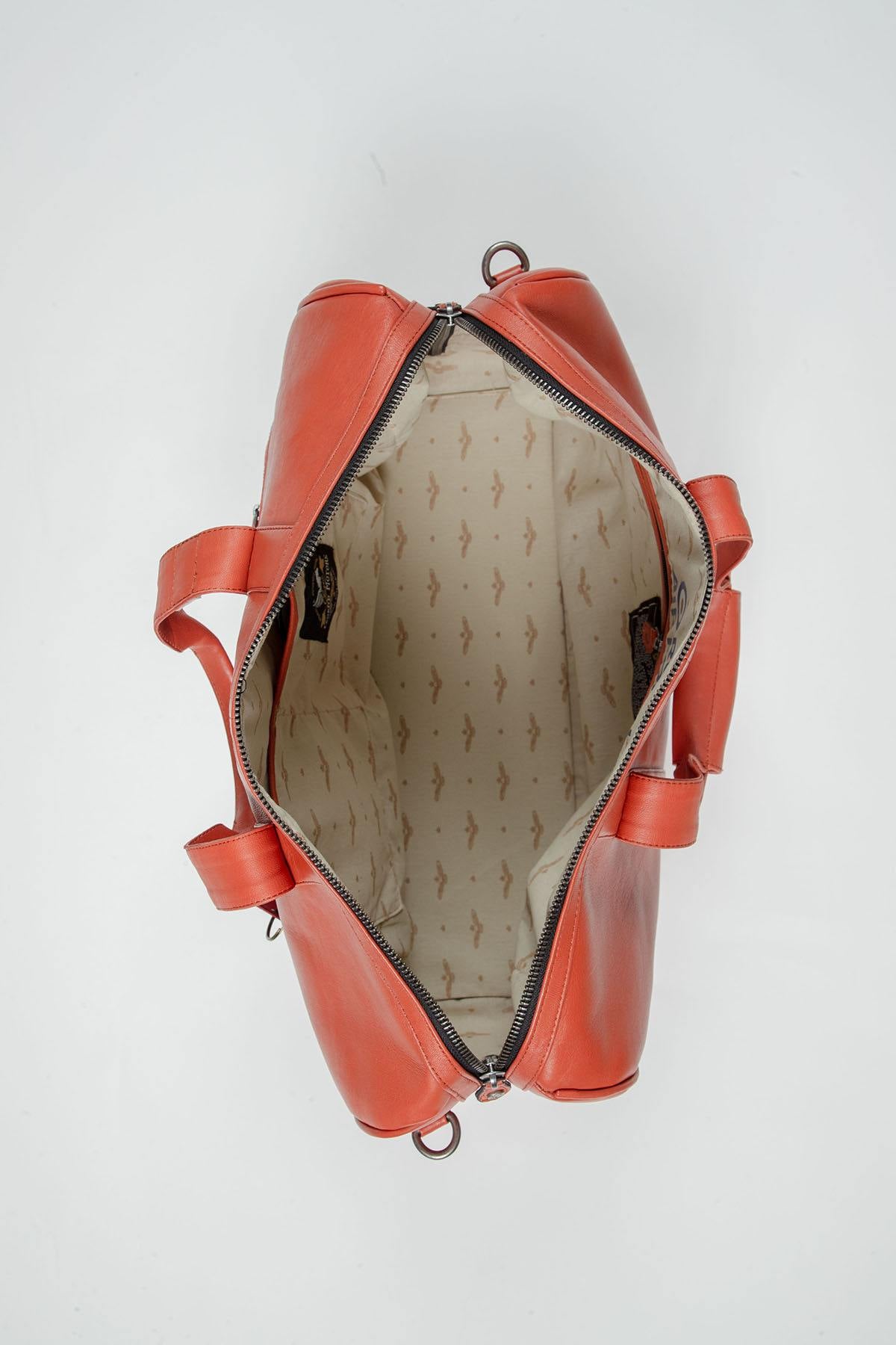 Orange leather travel bag with aviation theme - Image n°4