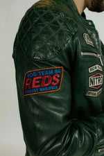 Green leather jacket with textured shoulders and racing badges - Image n°4