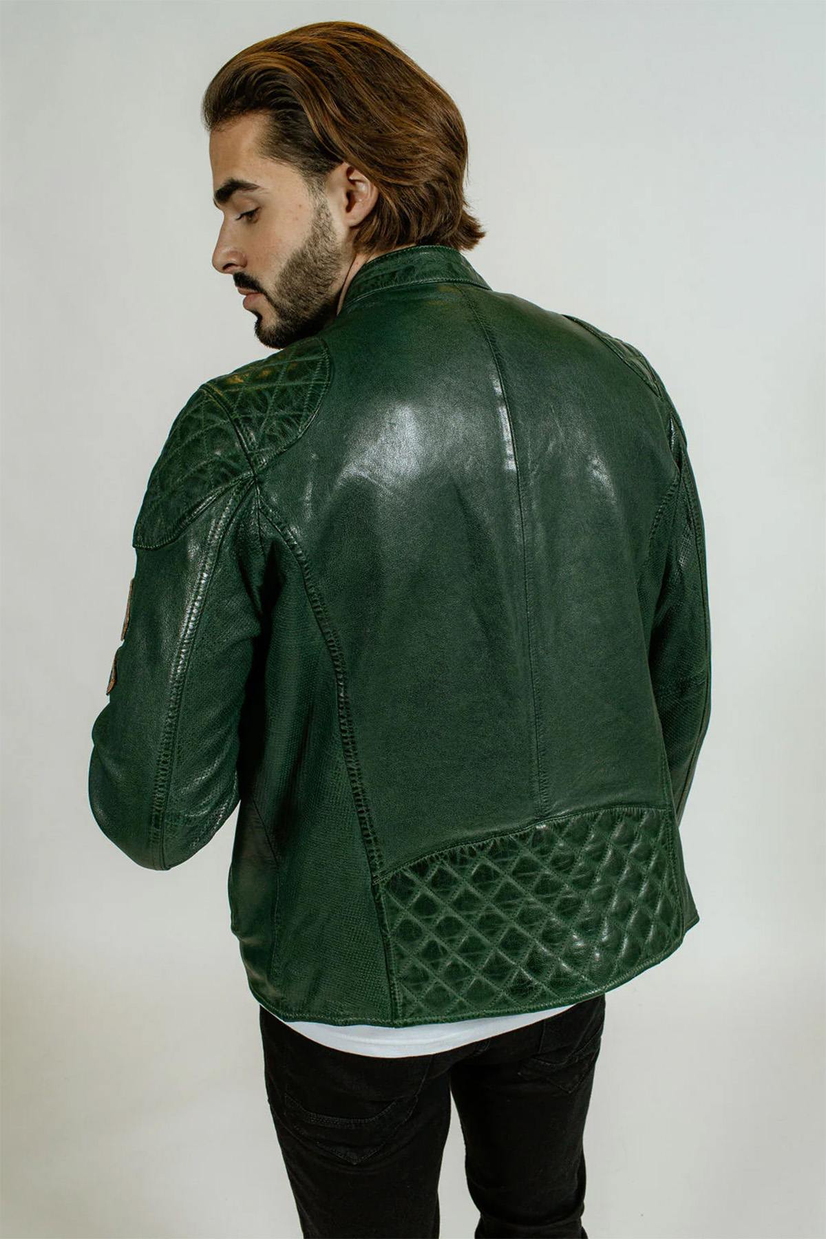 Green leather jacket with textured shoulders and racing badges - Image n°5