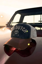 Embroidered cotton cap with worn effect in blue, white and red - Image n°1