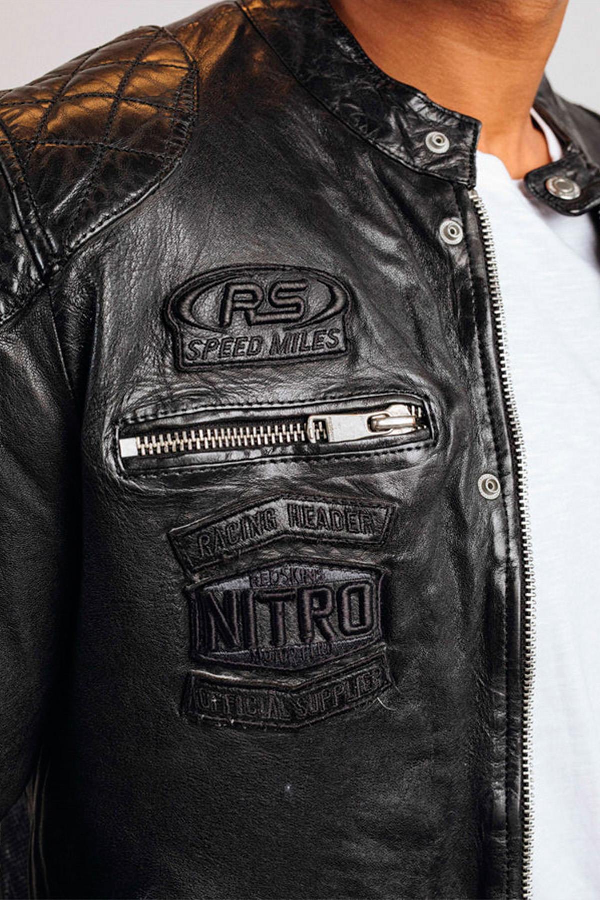 Black leather biker jacket with tone-on-tone patches and embroidery - Image n°2