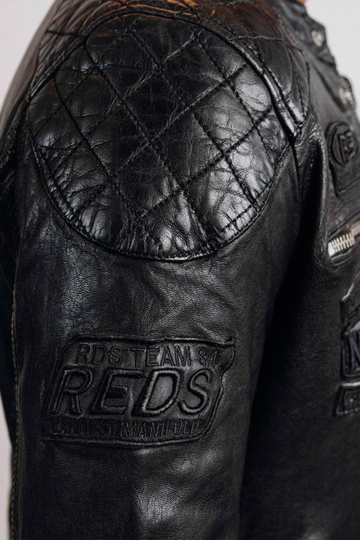 Black leather biker jacket with tone-on-tone patches and embroidery - Image n°3