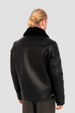 Black leather jacket with fur collar and drawstring strap - Image n°4