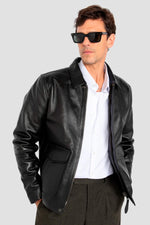 Black leather jacket with shirt collar and flap pockets - Image n°1