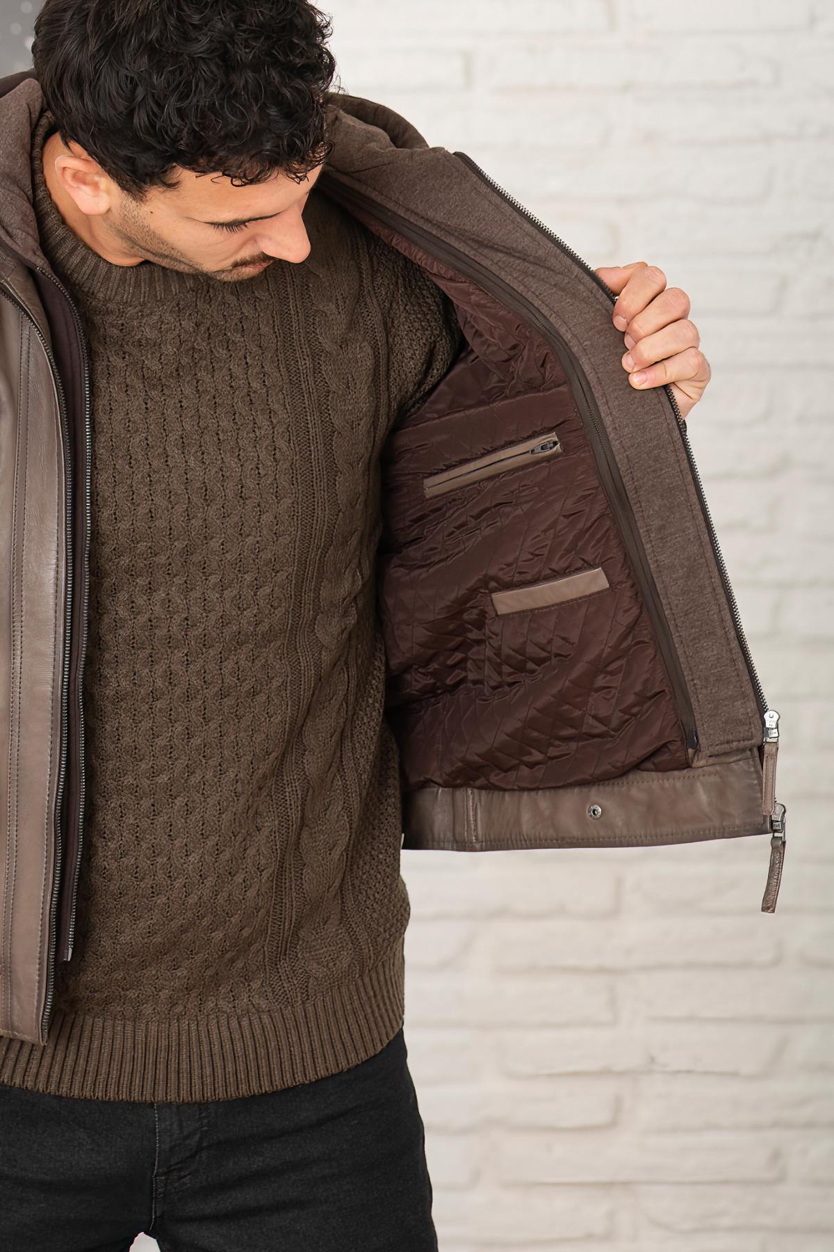 Serge Pariente's taupe lambskin jacket with a removable jersey hood. - Image n°6