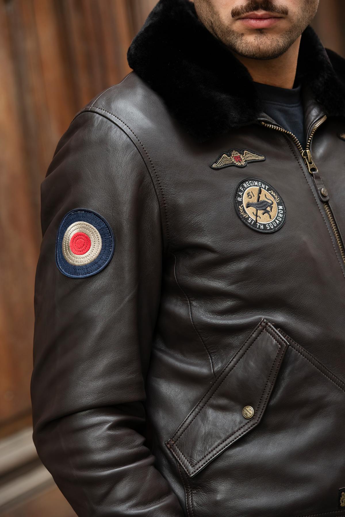 Dark brown leather bomber jacket with Royal Air Force patches - Image n°2