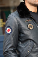 Navy blue leather bomber jacket with Royal Air Force patches - Image n°2