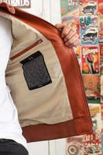 Motorsport-inspired sheep leather jacket in rusty orange, relaxed fit. - Image n°5