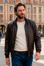 Deep brown lambskin jacket by Serge Pariente, soft and rider-inspired. - Image n°1