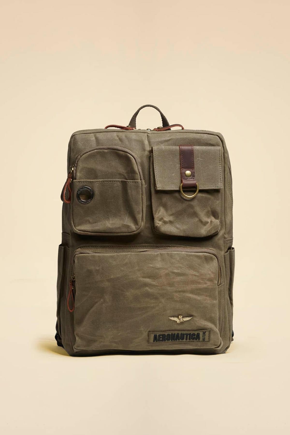 Military-style backpack in khaki cotton canvas - Image n°1