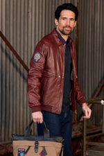 Cognac sheepskin aviator jacket with Patrouille de France insignia. - Image n°1