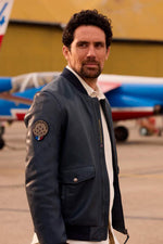 Aviation-inspired lambskin jacket in ocean blue with pilot pockets. - Image n°1