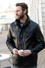 Black leather jacket with stand-up collar and removable facing - Image n°2