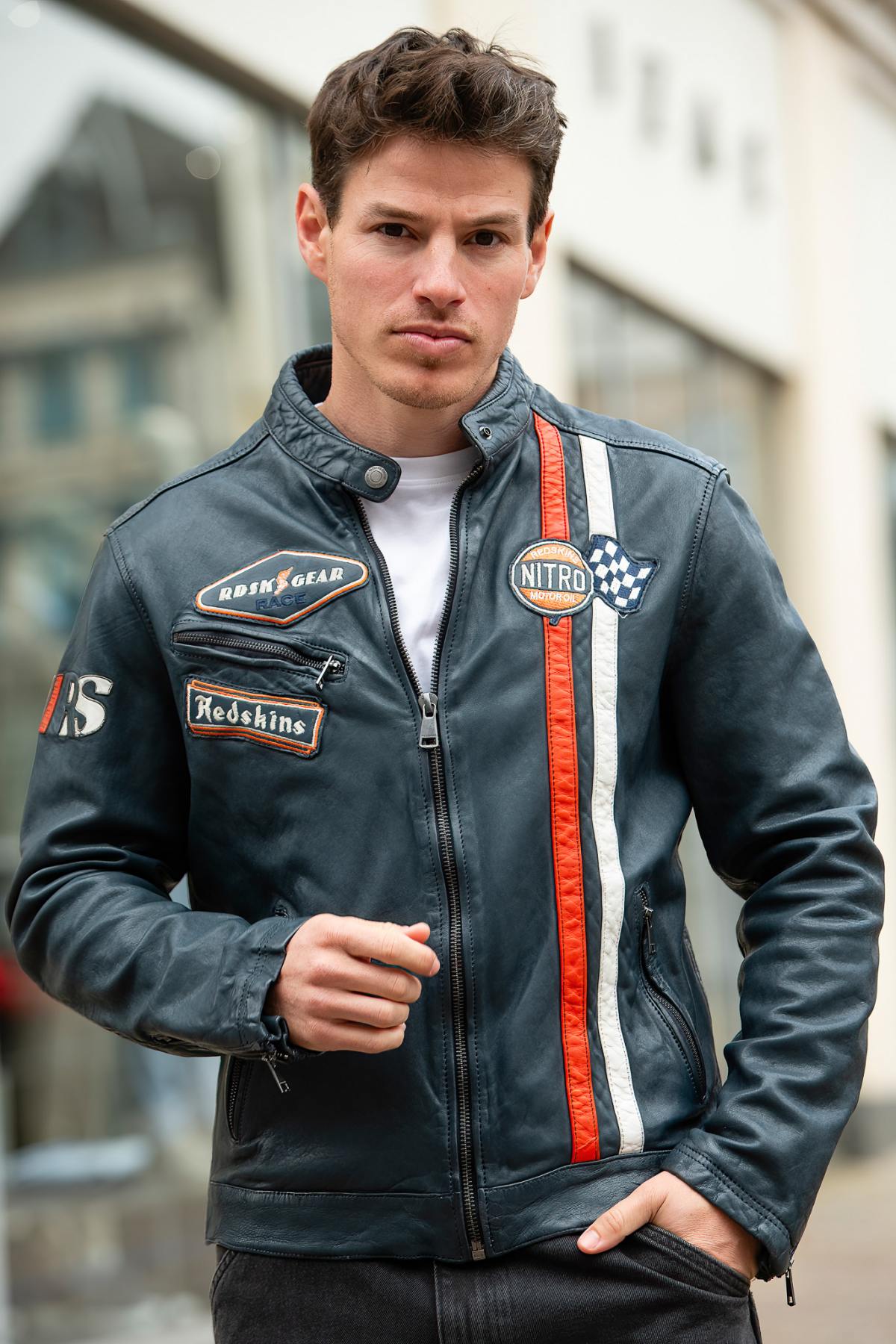 Racing-style sheepskin leather jacket in ocean blue, sleek and urban. - Image n°1