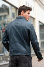 Racing-style sheepskin leather jacket in ocean blue, sleek and urban. - Image n°5