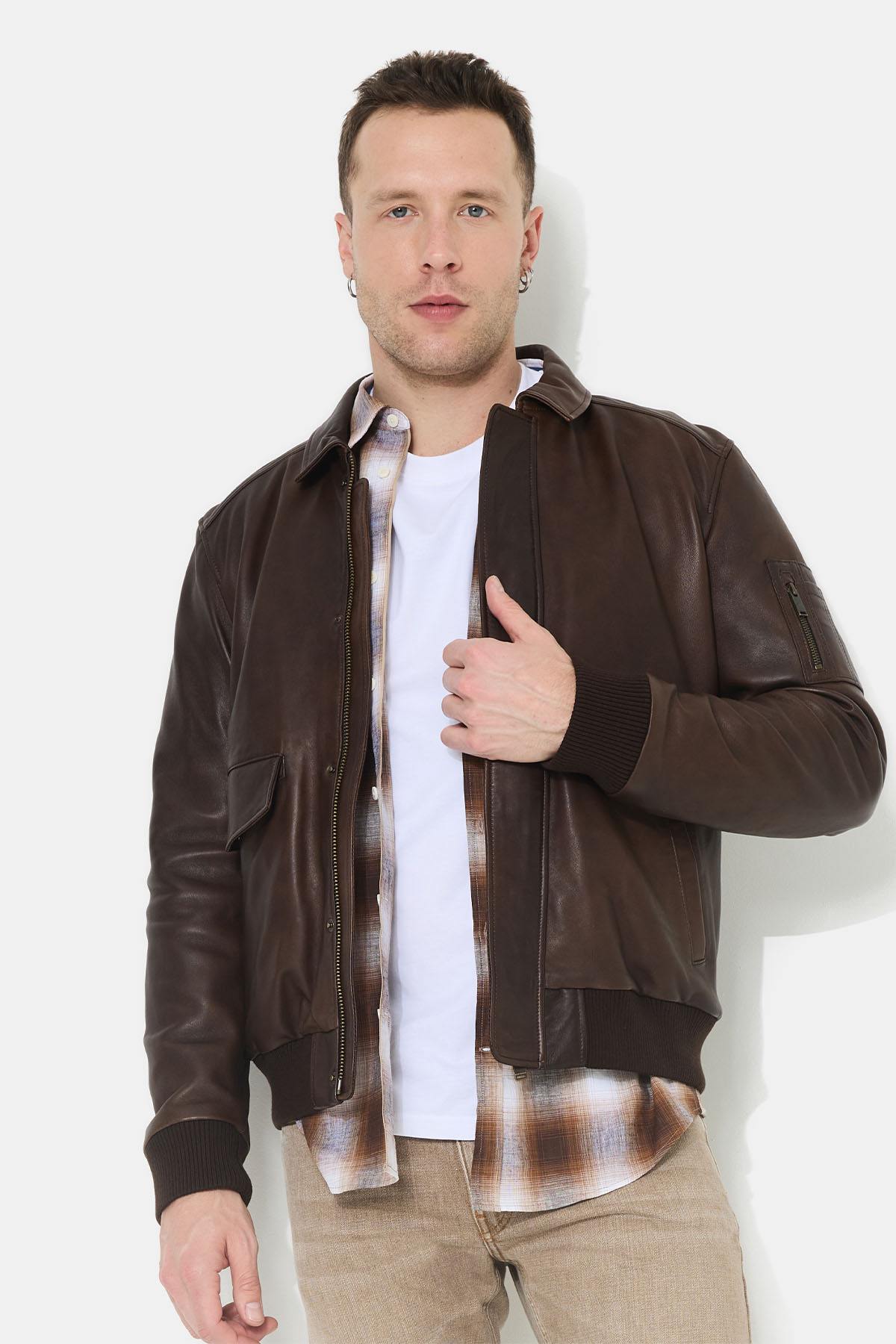 Brown leather aviator jacket with embossed back - Image n°1