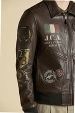 Patched and printed brown leather pilot jacket - Image n°7